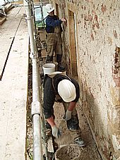 Benny and Finton using lime mortar